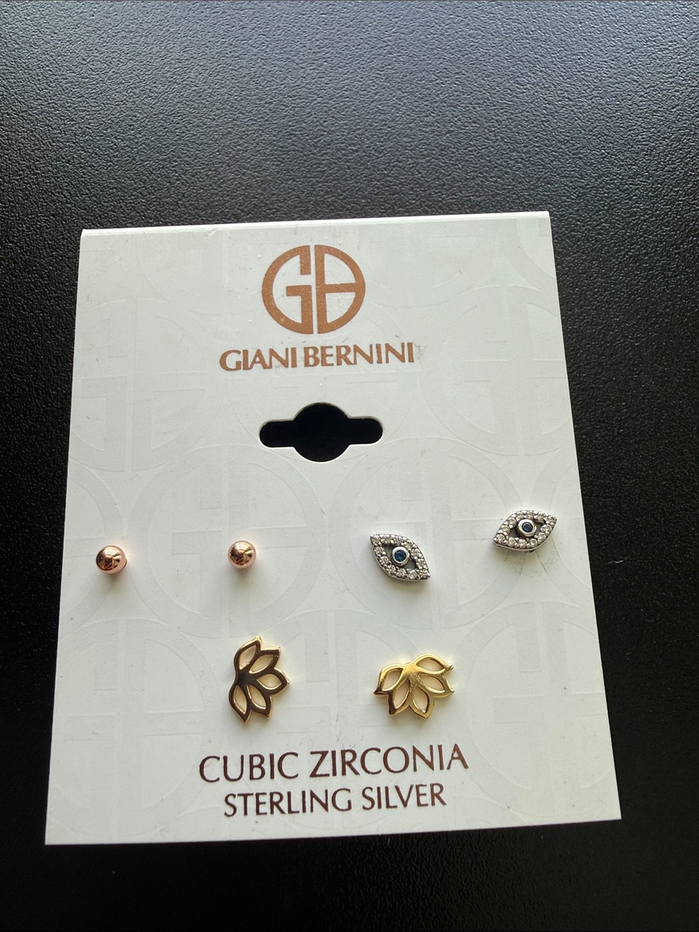 Bernini earring stud set multiple designs from cubic zirconia & sterling silver.